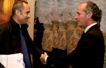 zaia shaking hands with costs